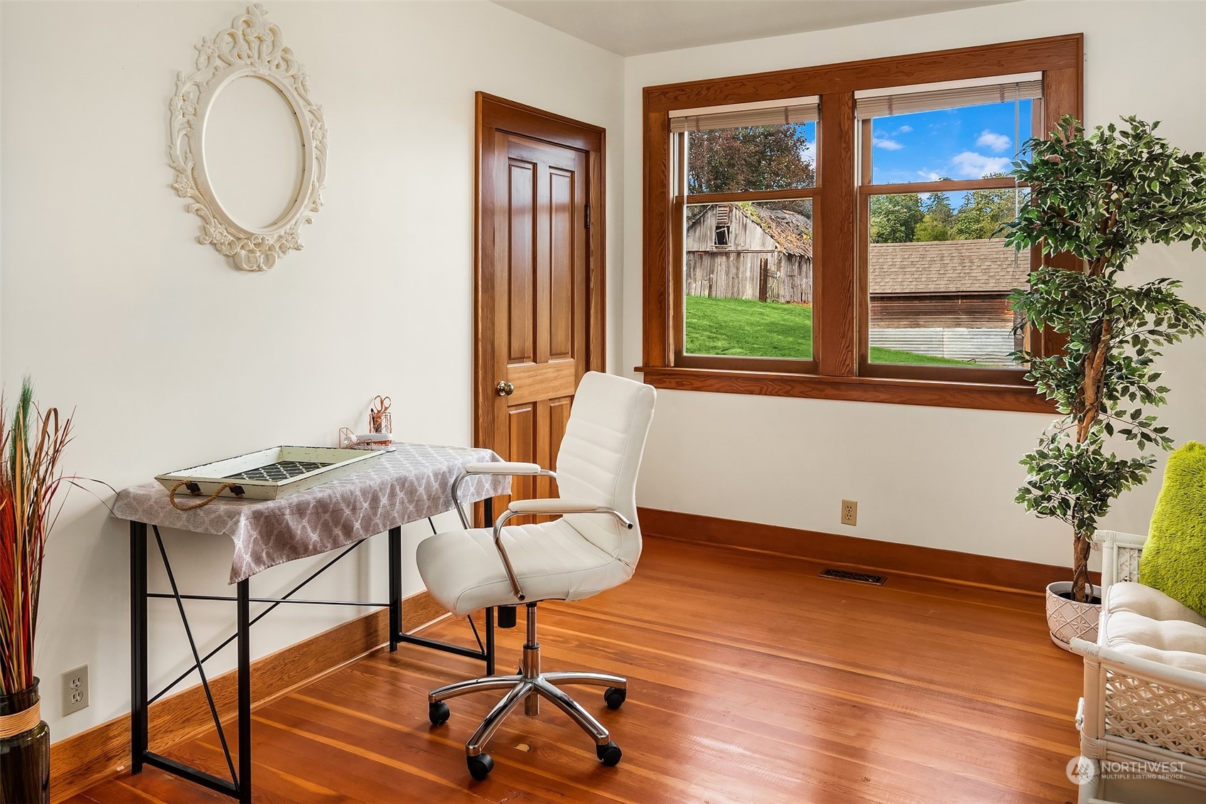 19589 Kelleher Road Burlington, WA 98233 - Photo 17 of 39 a view of a room with furniture wooden floor and windows