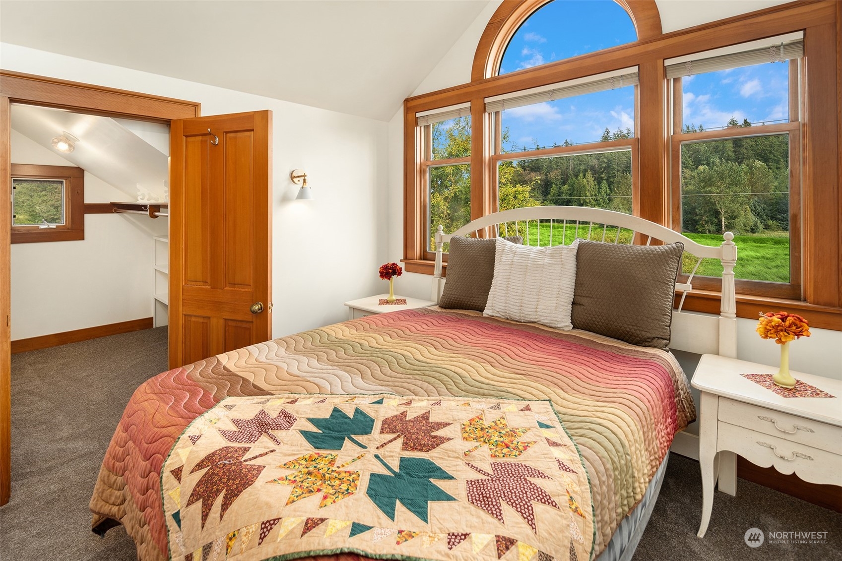 19589 Kelleher Road Burlington, WA 98233 - Photo 22 of 39 a bedroom with a bed and a window