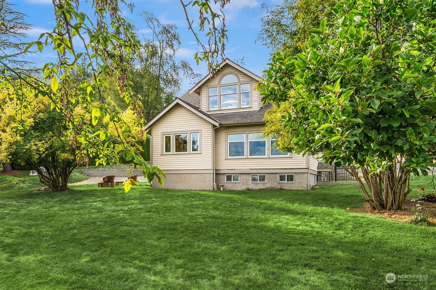 19589 Kelleher Road Burlington, WA 98233 - Photo 30 of 39 a front view of a house with a yard and trees