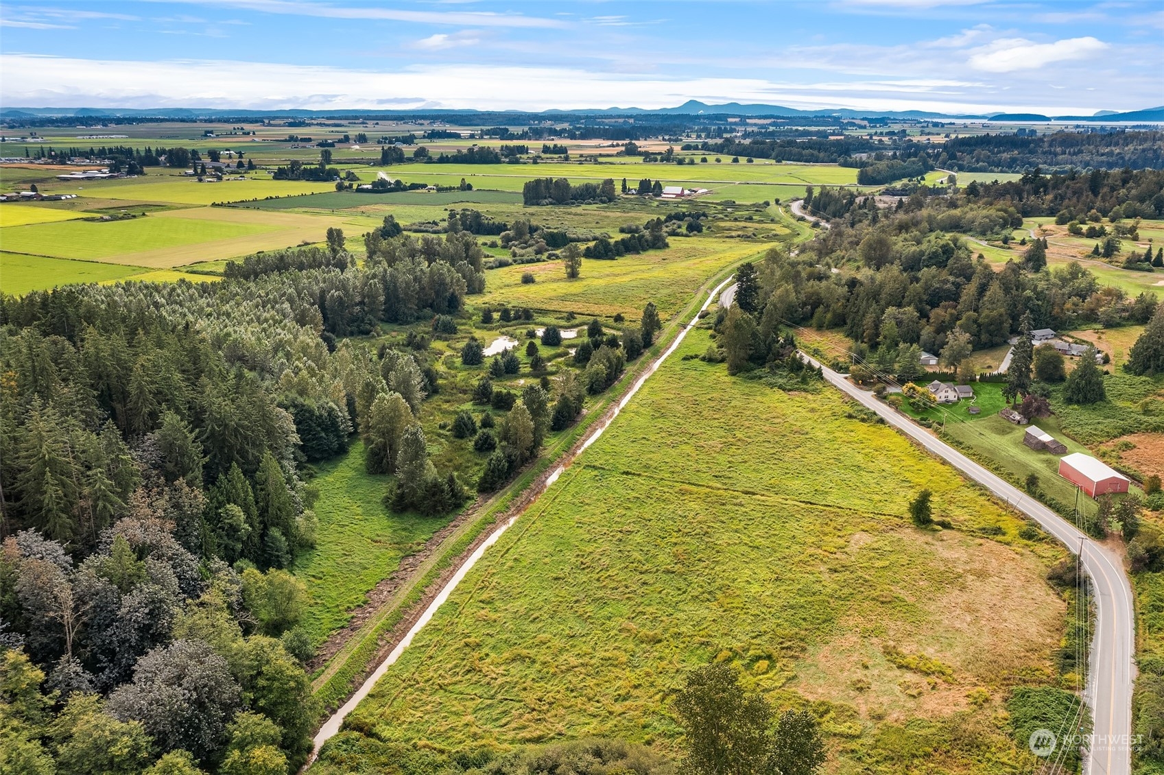 19589 Kelleher Road Burlington, WA 98233 - Photo 36 of 39 a view of a swimming pool and an ocean view
