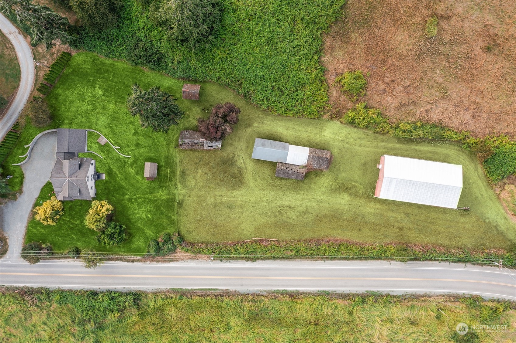 19589 Kelleher Road Burlington, WA 98233 - Photo 39 of 39 a view of a yard with an outdoor space