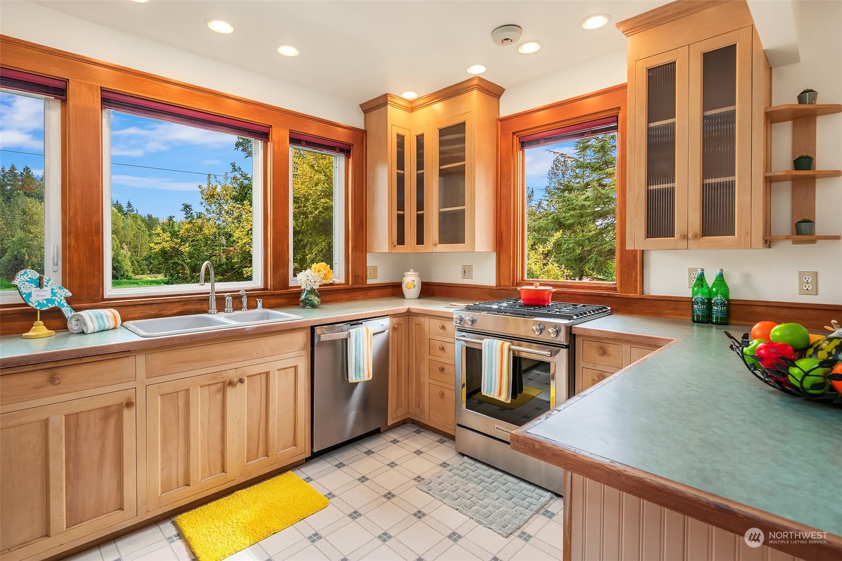 19589 Kelleher Road Burlington, WA 98233 - Photo 9 of 39 a kitchen with stainless steel appliances granite countertop a stove and a sink
