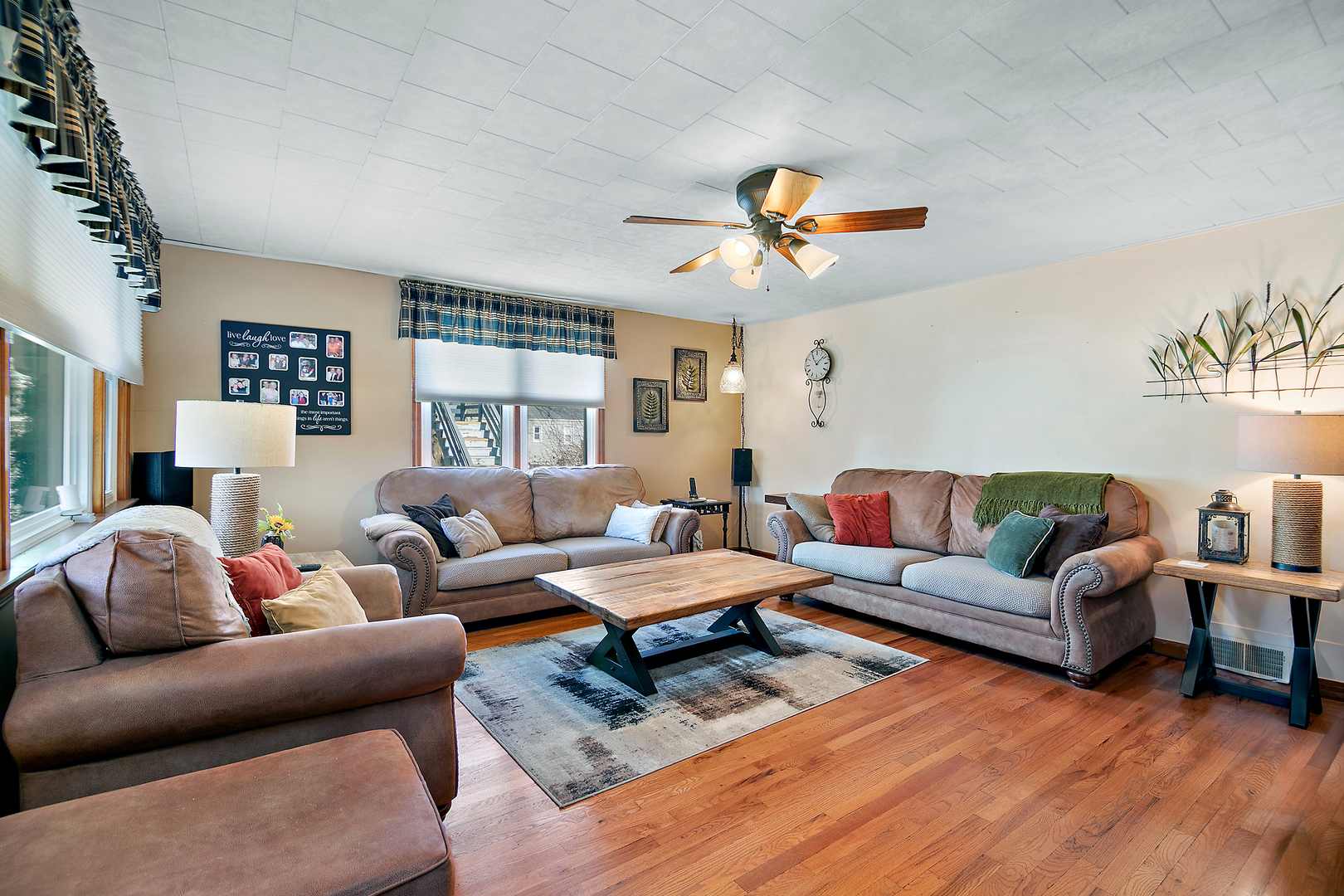 460 South Winfield Avenue Kankakee, IL 60901 - Photo 11 of 28 a living room with furniture a ceiling fan and a window