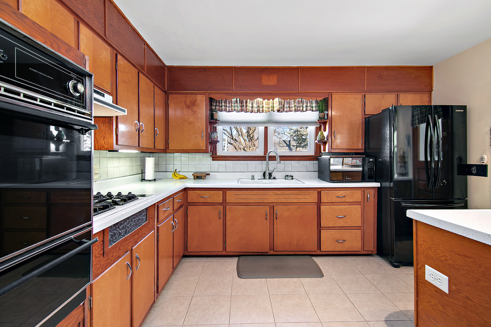 460 South Winfield Avenue Kankakee, IL 60901 - Photo 15 of 28 a kitchen with stainless steel appliances granite countertop a refrigerator and a sink