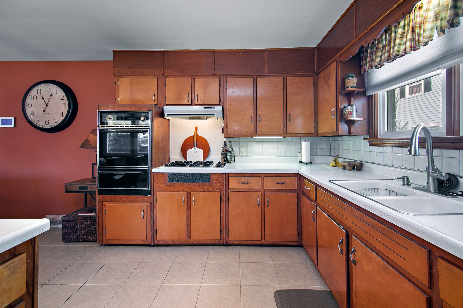 460 South Winfield Avenue Kankakee, IL 60901 - Photo 16 of 28 a kitchen with stainless steel appliances granite countertop a sink and a stove top oven