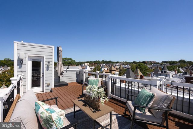 a view of swimming pool outdoor seating