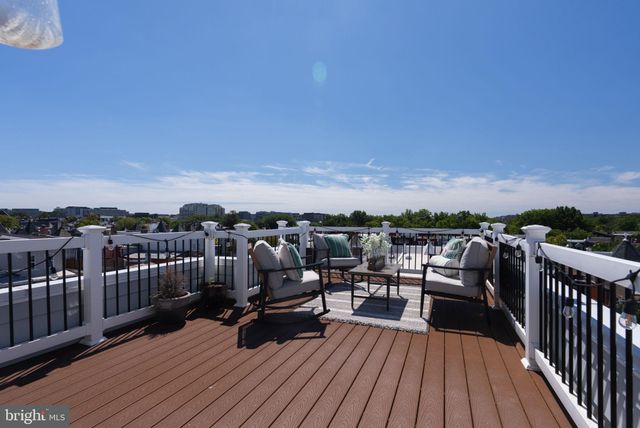a view of a balcony with city view