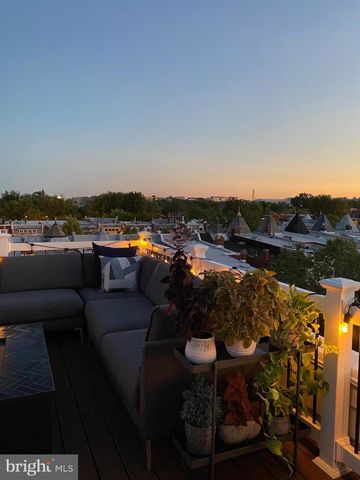 a picture of a bathroom with a shower