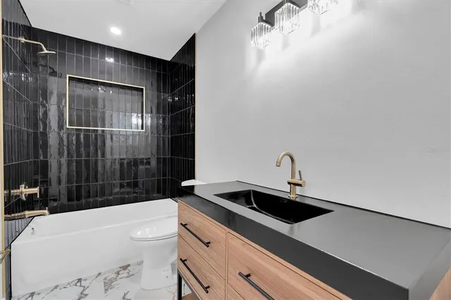 a view of a porch with wooden floor and fence