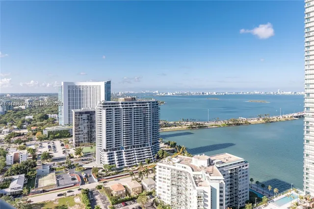 a view of a city with ocean