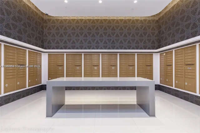 a front view of a building with a garden