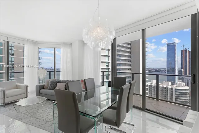 a view of a livingroom with furniture and window