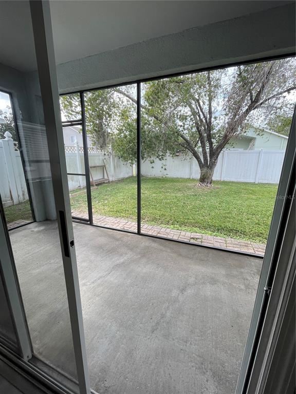 4939 Woodmere Road Land O Lakes, FL 34639 - Photo 6 of 43 a view of backyard with green space