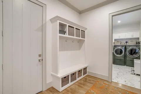 a view of a kitchen with a sink and cabinets