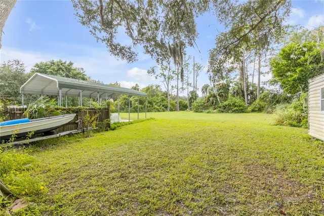 a view of a lake with a garden
