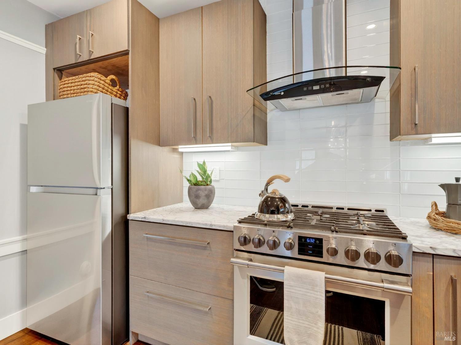 2 Bulson Court Napa, CA 94559 - Photo 17 of 30 a kitchen with stainless steel appliances granite countertop a stove a refrigerator and a refrigerator