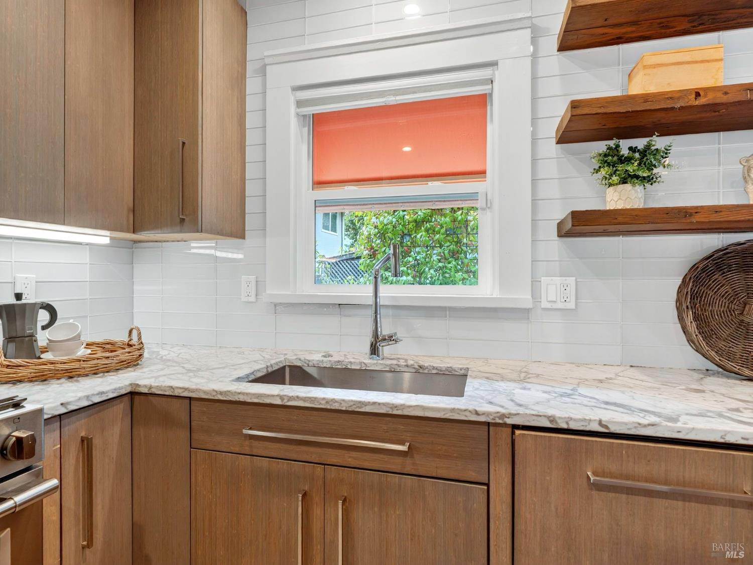 2 Bulson Court Napa, CA 94559 - Photo 18 of 30 a kitchen with granite countertop white cabinets and a window