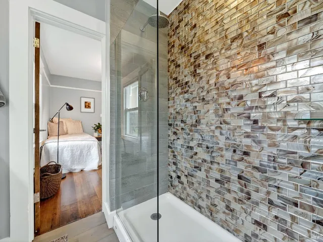 a bed room with a bed and a window