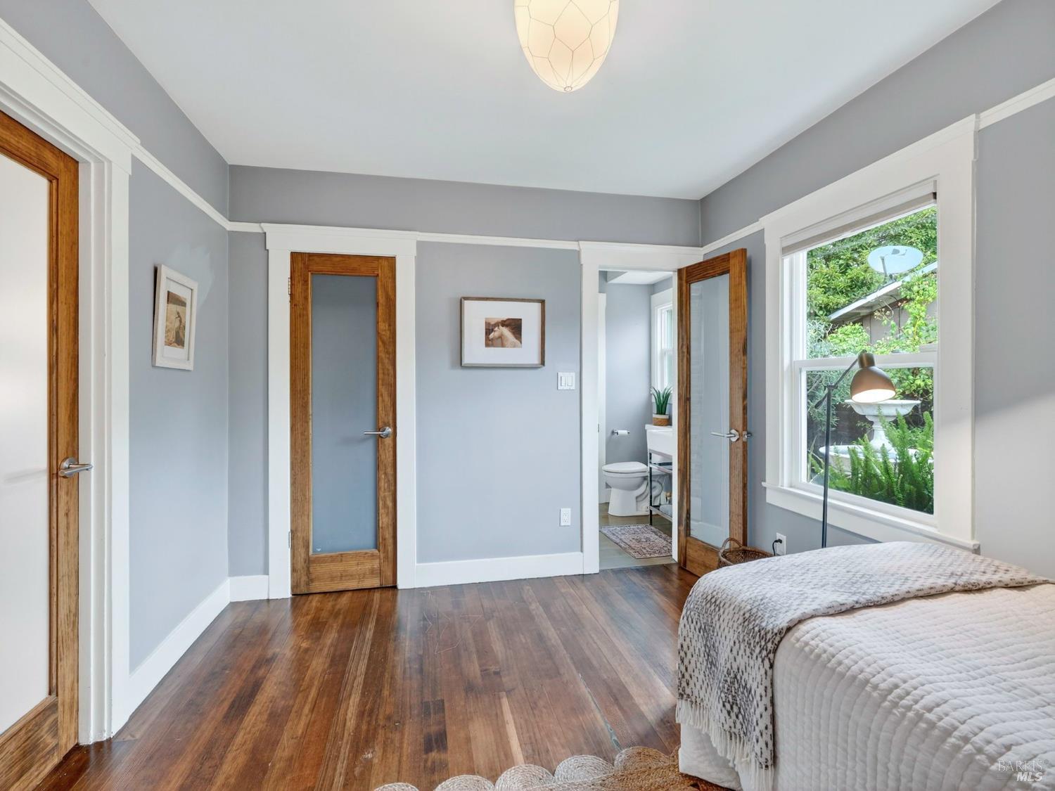 2 Bulson Court Napa, CA 94559 - Photo 27 of 30 a bedroom with a bed and a large window