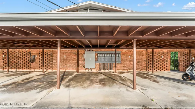 a view of a room with wooden walls