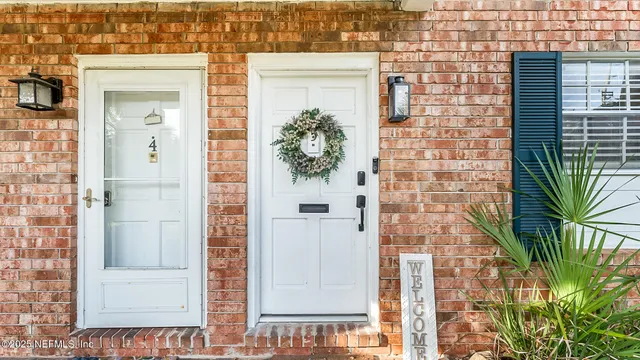 view of a bathroom with a shower and a mirror
