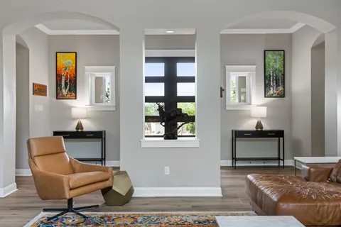 a living room with furniture and a window