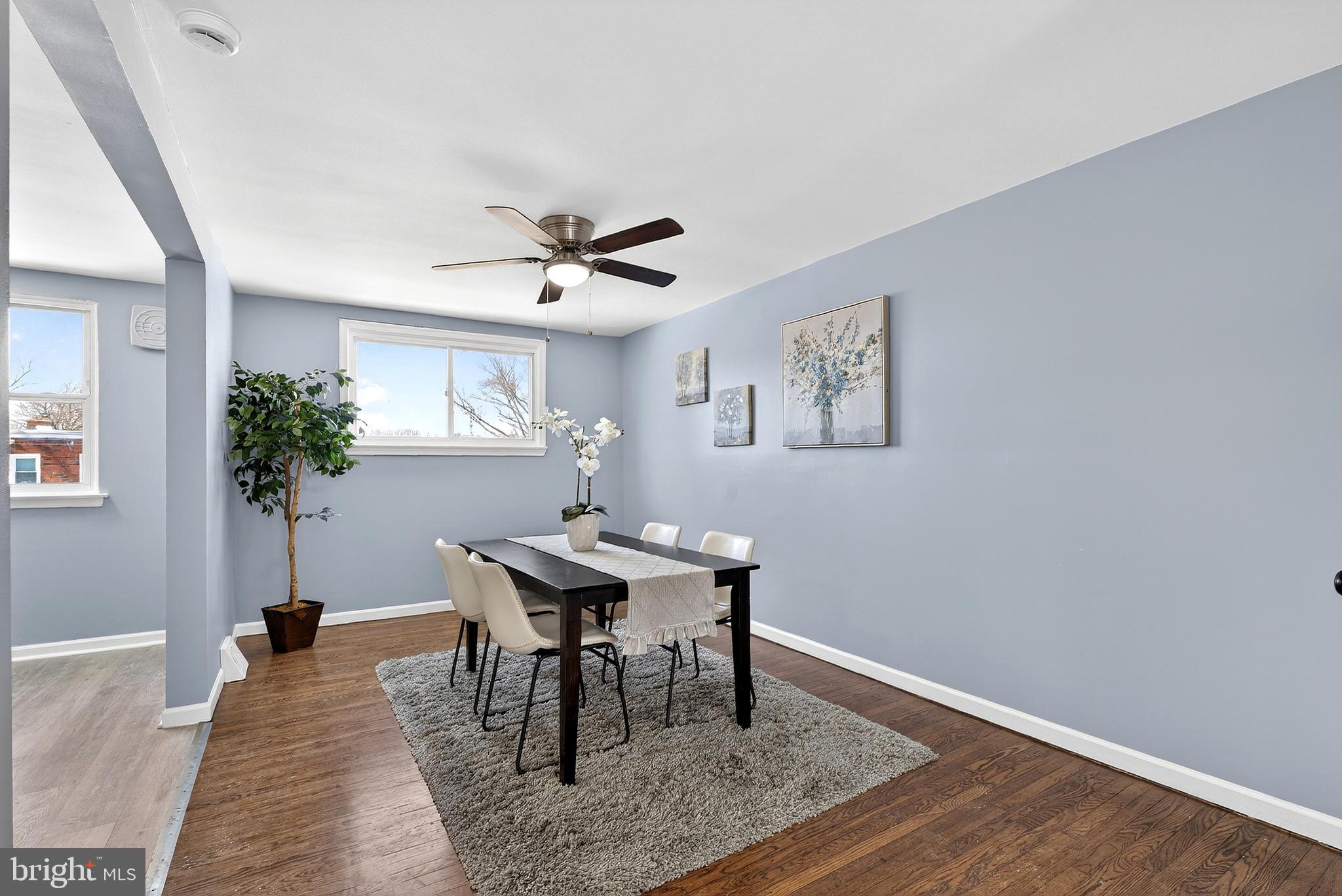 1216 Harshaw Road Brookhaven, PA 19015 - Photo 11 of 38 a view of a work space with furniture and a potted plant