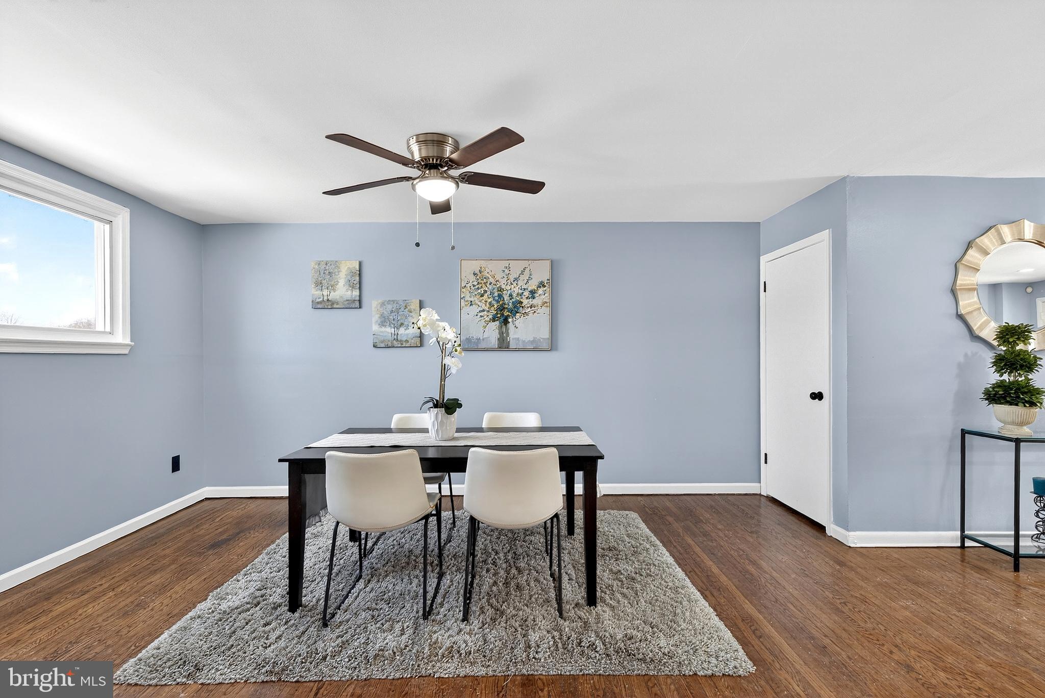 1216 Harshaw Road Brookhaven, PA 19015 - Photo 14 of 38 a view of a dining room with furniture and wooden floor