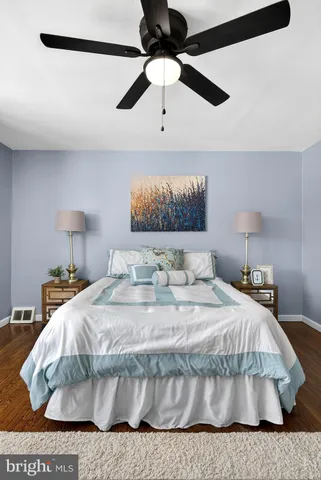 a large white bed in a white room