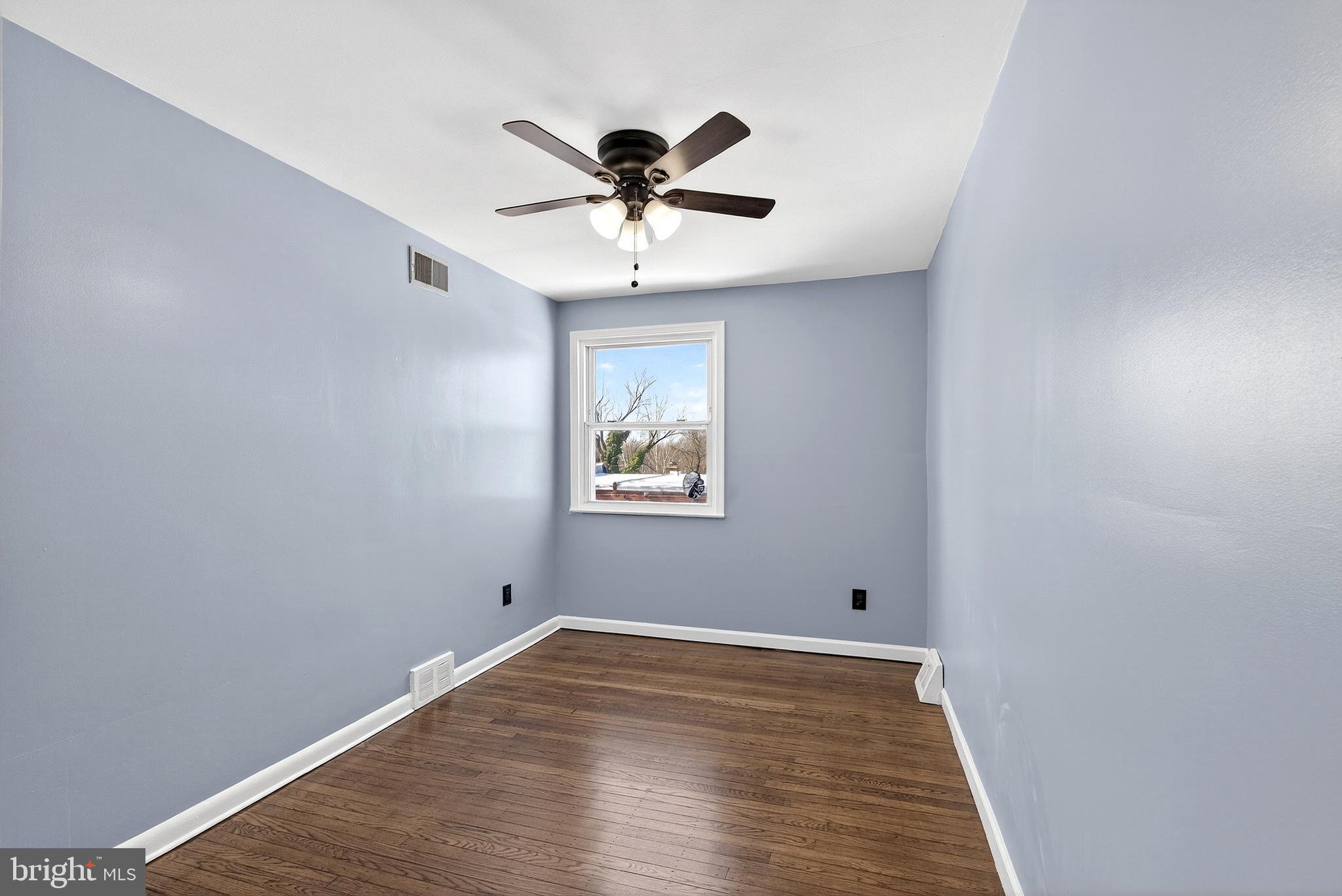 1216 Harshaw Road Brookhaven, PA 19015 - Photo 24 of 38 a view of empty room with wooden floor