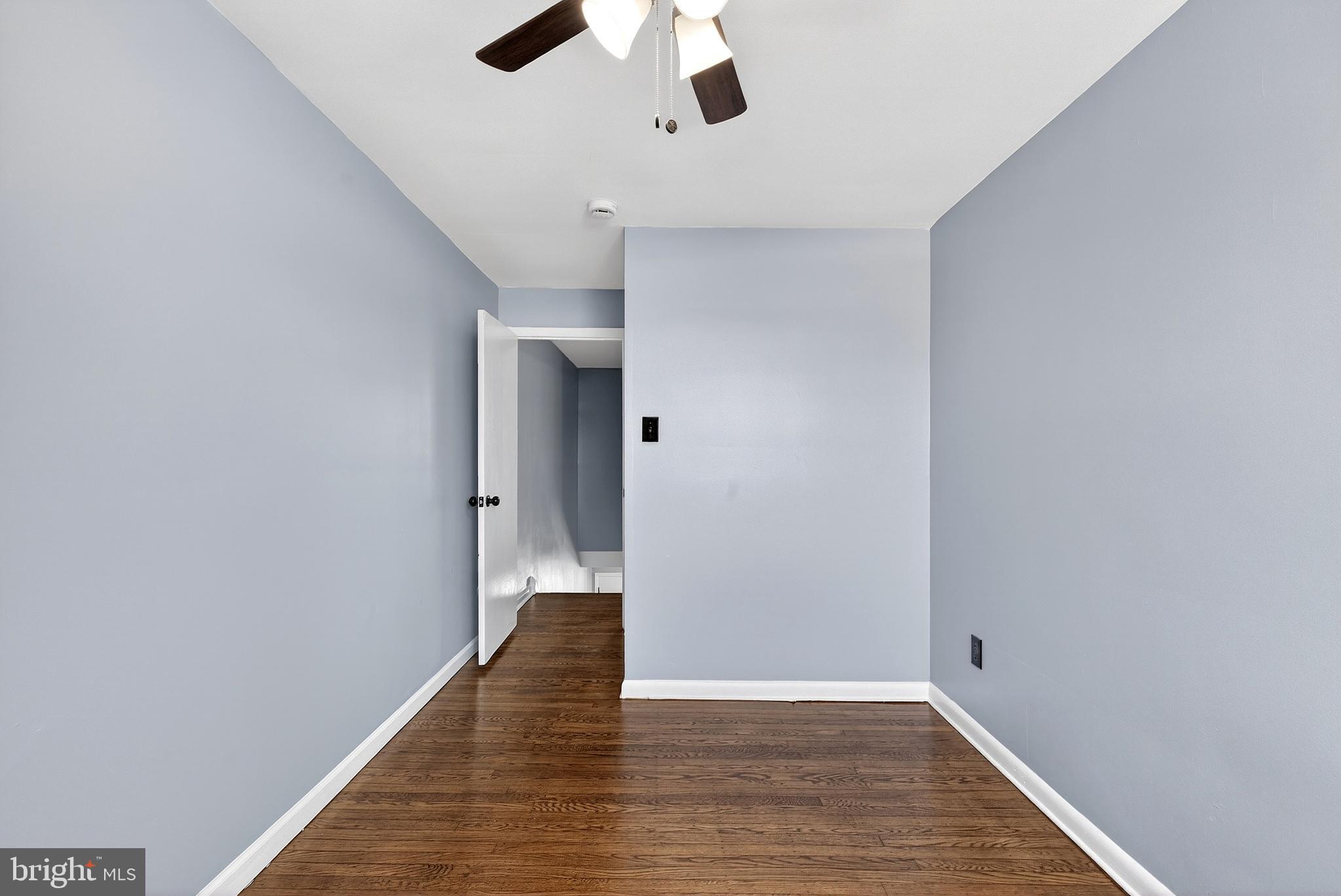 1216 Harshaw Road Brookhaven, PA 19015 - Photo 25 of 38 a view of an empty room with wooden floor