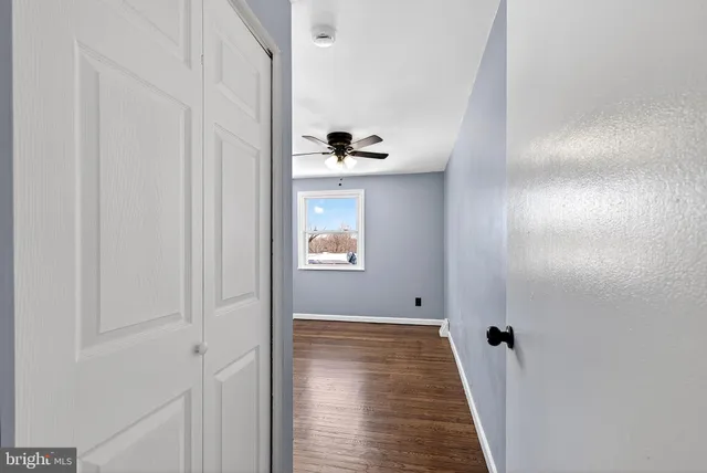 a view of entryway with wooden floor