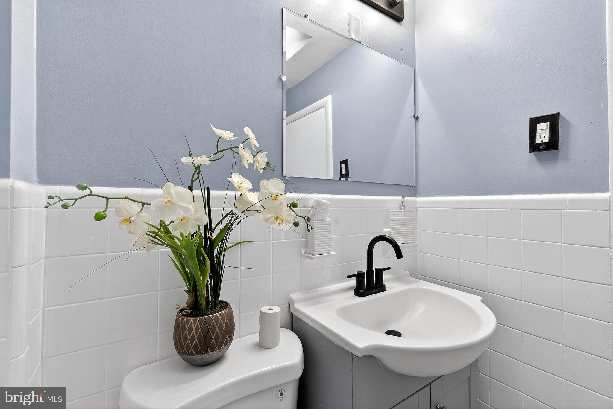 1216 Harshaw Road Brookhaven, PA 19015 - Photo 30 of 38 a sink with a potted plant on it