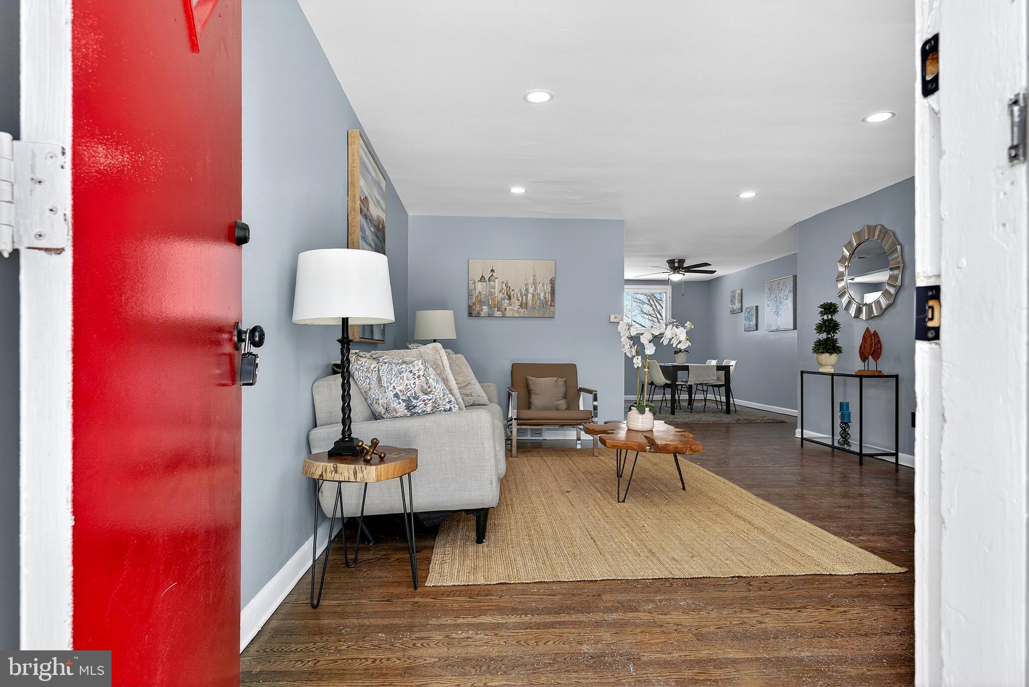 1216 Harshaw Road Brookhaven, PA 19015 - Photo 3 of 38 a living room with furniture and a wooden floor