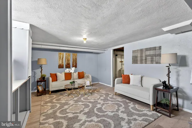 a living room with furniture and a couch