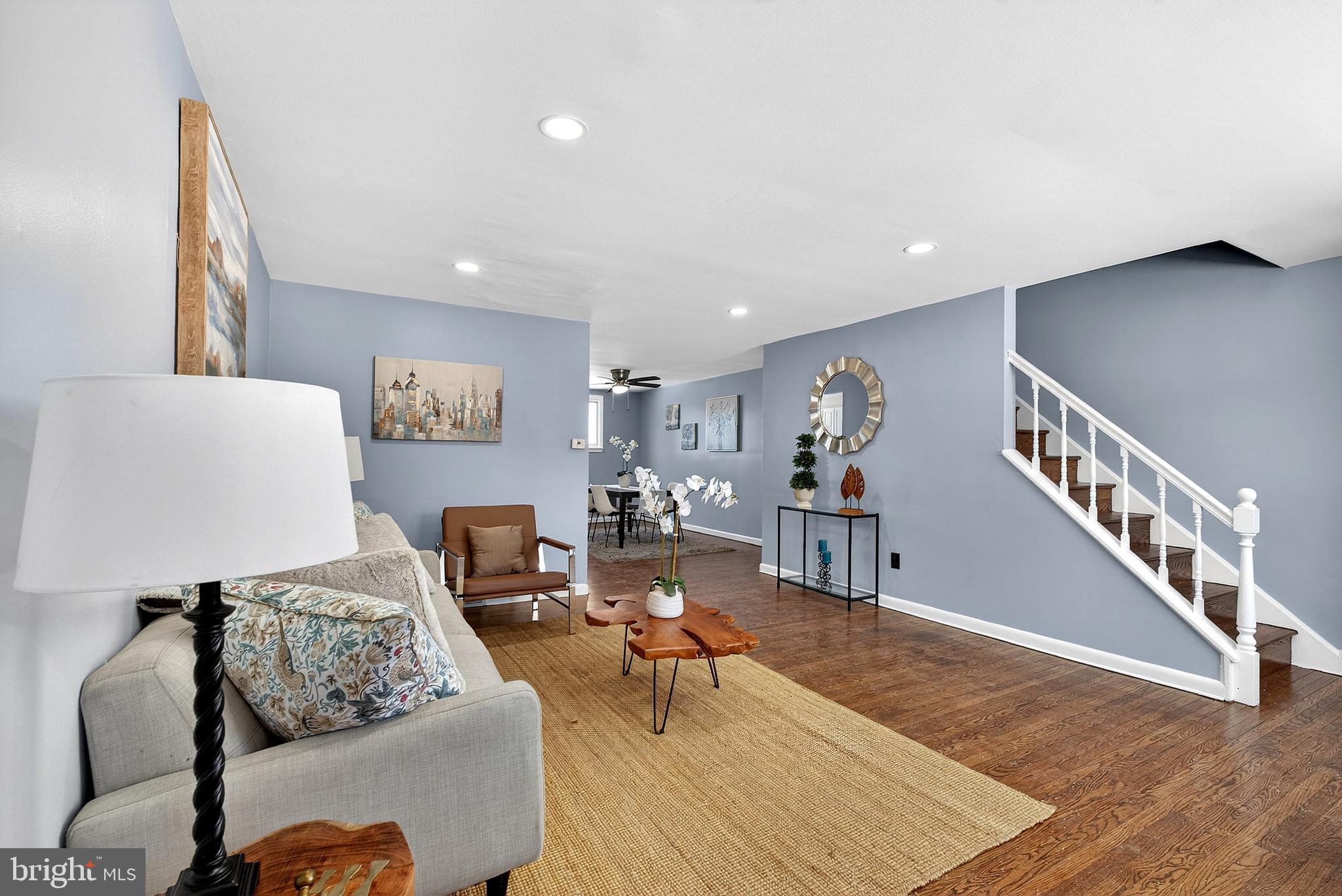 1216 Harshaw Road Brookhaven, PA 19015 - Photo 4 of 38 a living room with furniture and wooden floor