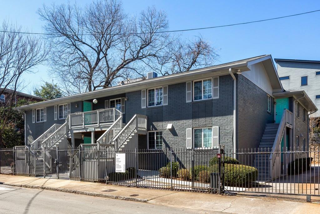 210 Sampson Street Northeast, Unit 3 Atlanta, GA 30312 - Photo 1 of 1 a front view of a house with glass windows and plants