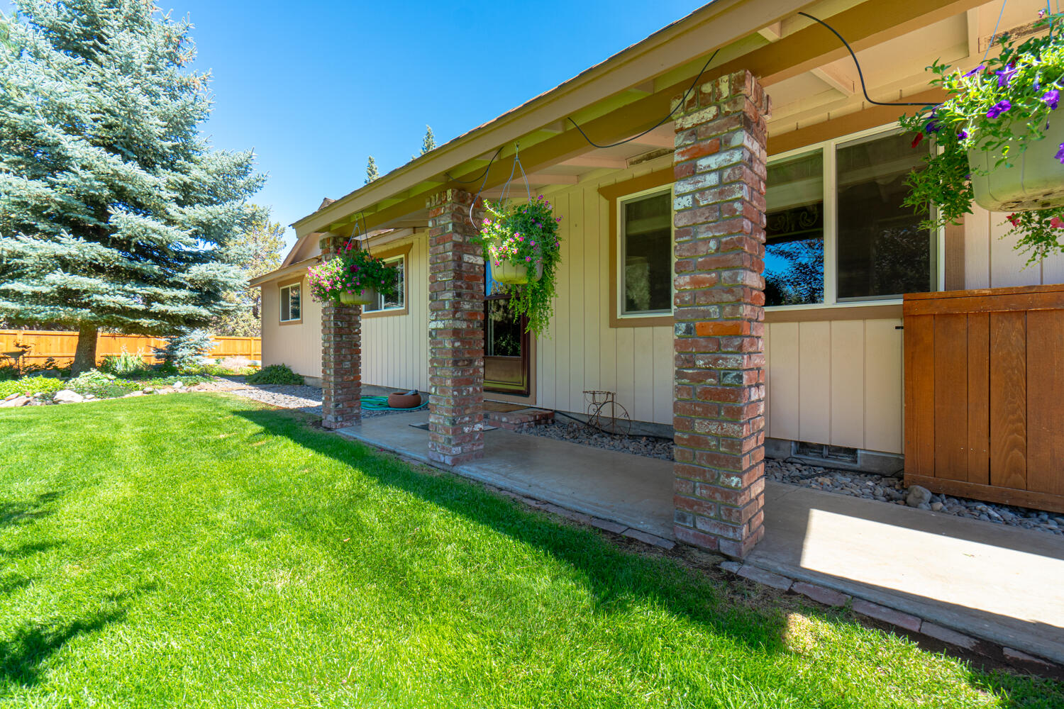 2218 Southwest 79th Street Redmond, OR 97756 - Photo 4 of 54 front view of house with a yard