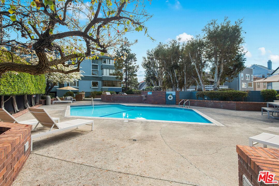 311 Bora Bora Way, Unit 3207 Marina del Rey, CA 90292 - Photo 47 of 54 a view of backyard with swimming pool and seating space
