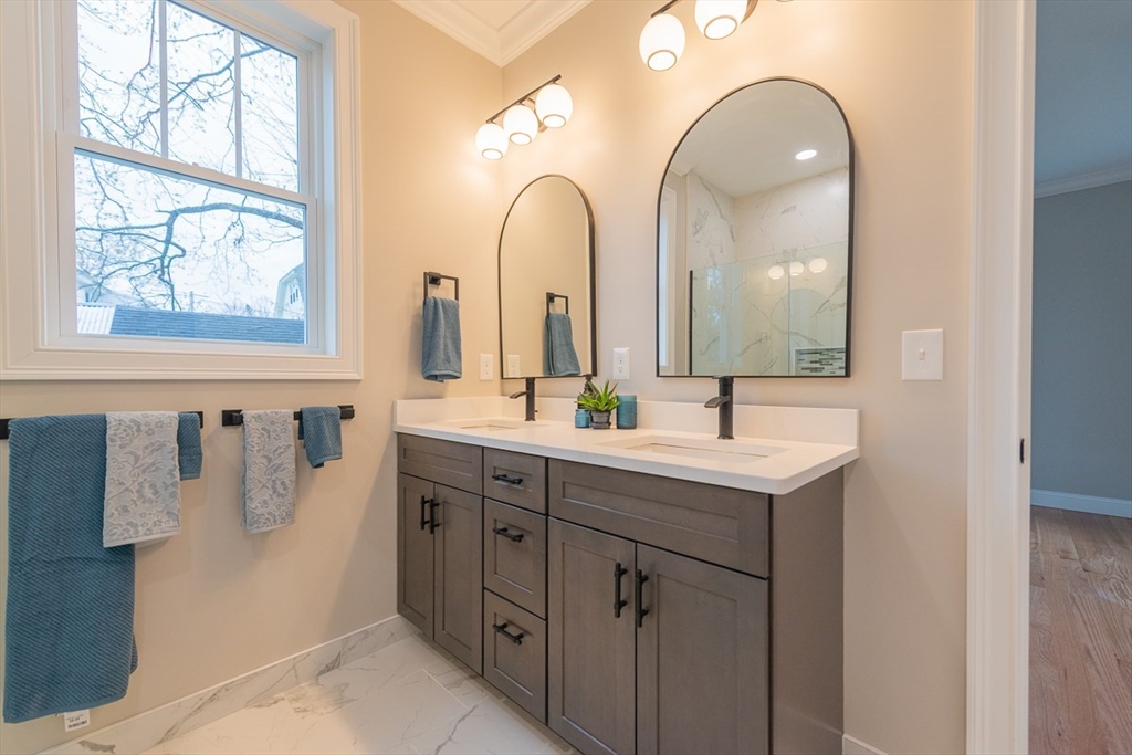 10 Pleasant Street Templeton, MA 01436 - Photo 18 of 41 a bathroom with a double vanity sink and a mirror