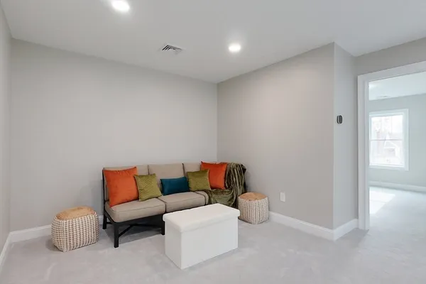 a blue room with a couch
