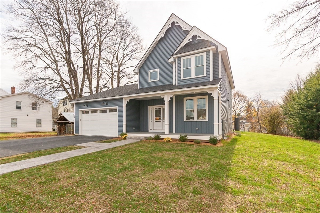 10 Pleasant Street Templeton, MA 01436 - Photo 34 of 41 a view of a yard in front of a house with large tree
