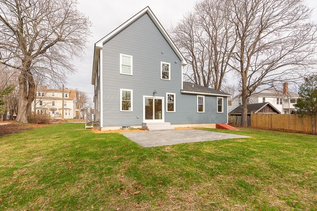 10 Pleasant Street Templeton, MA 01436 - Photo 36 of 41 a front view of a house with a garden and trees