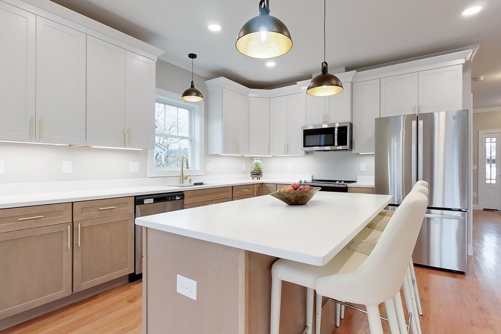 10 Pleasant Street Templeton, MA 01436 - Photo 7 of 41 a kitchen with cabinets a center island a counter space stainless steel appliances and cabinets