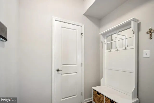 a bathroom with a double vanity sink and mirror