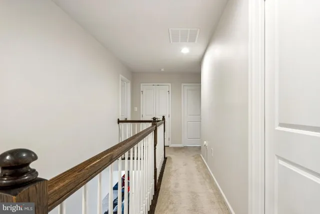 a bedroom with a bed and a cabinets