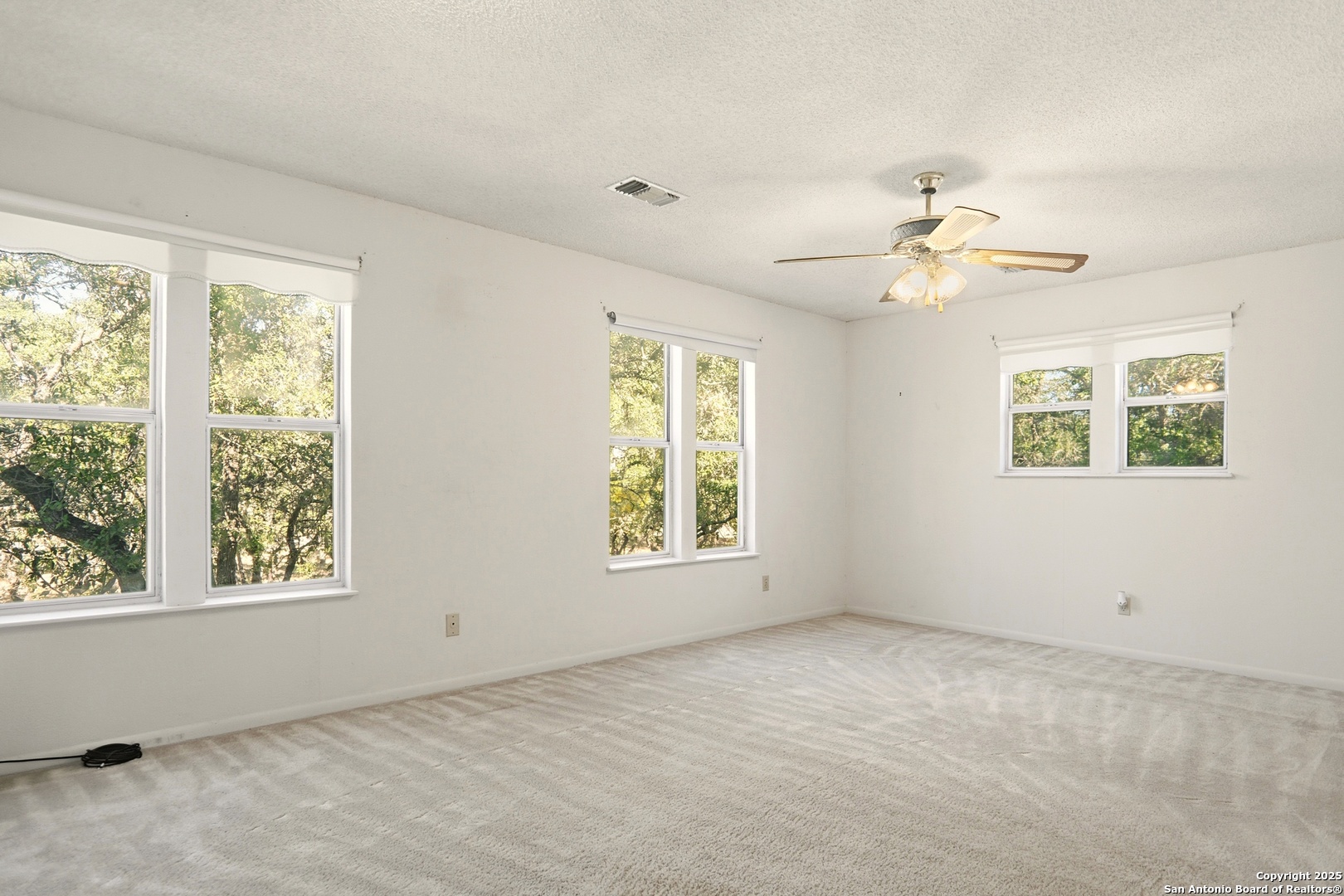 261 Fawn Lane Spring Branch, TX 78070 - Photo 14 of 36 a view of an empty room with a window