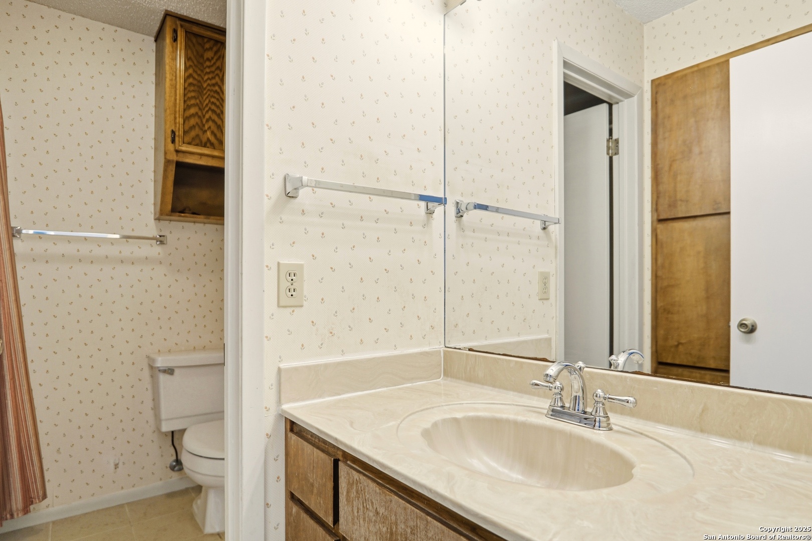 261 Fawn Lane Spring Branch, TX 78070 - Photo 20 of 36 a bathroom with a sink toilet and shower