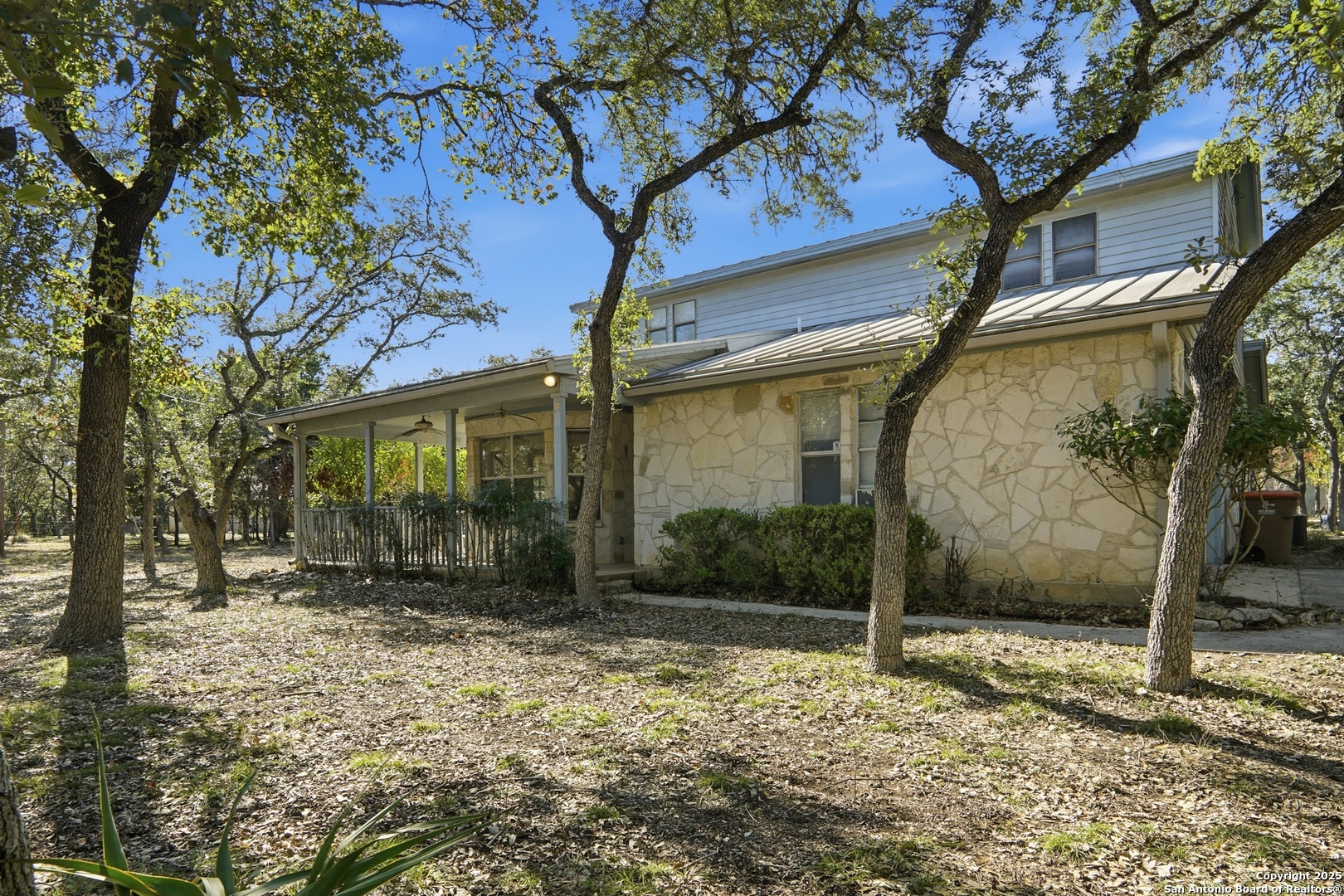 261 Fawn Lane Spring Branch, TX 78070 - Photo 2 of 36 a view of a house with a tree
