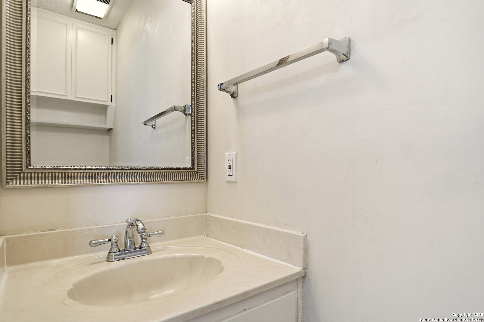 261 Fawn Lane Spring Branch, TX 78070 - Photo 21 of 36 a bathroom with a sink and a mirror